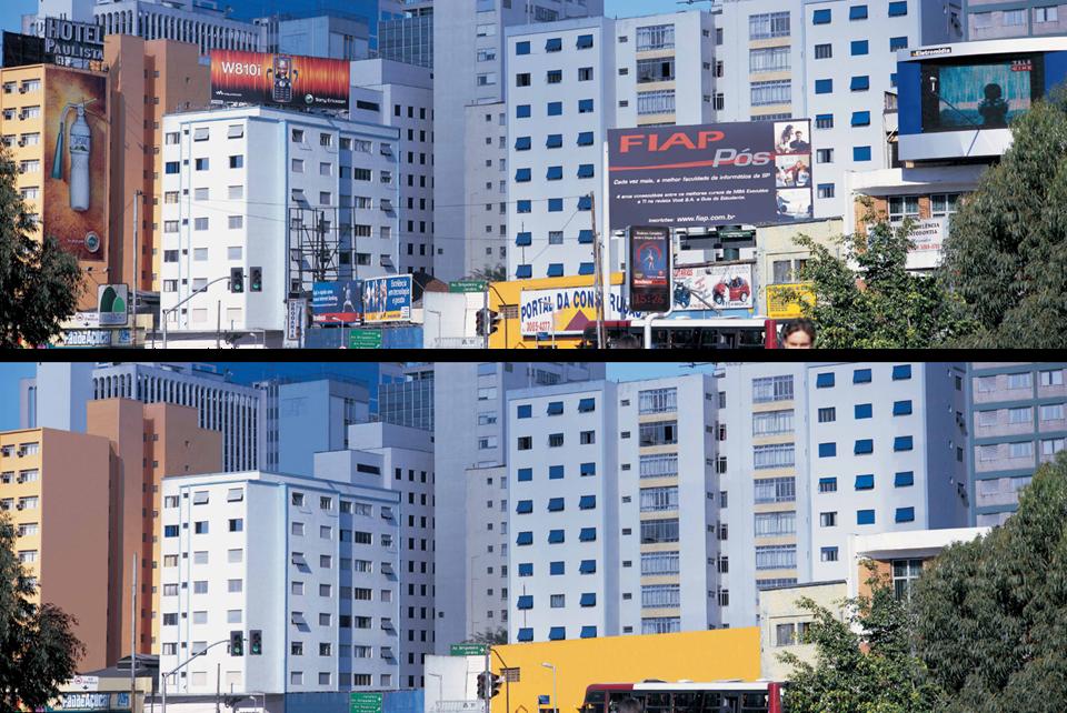 A before-and-after comparison of several high-rise apartments and commercial buildings. In the before photo, large billboards sit both on ground level and on top of some of the buildings. One building has a large advertisement stretched over the entire face of one wall. In the after photo, all of this is removed.